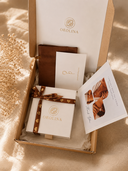 Orolina Premium Verpackung – Luxury Unboxing mit Schmuckbox, Herzband und Dankeskarte